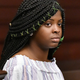 Kamiyah Mobley, who was raised with the name Alexis Kelly Manigo, sits in the courtroom before the sentencing hearing of Gloria Williams on May 3, 2018, at the Duval County Courthouse in Jacksonville, Fla.
